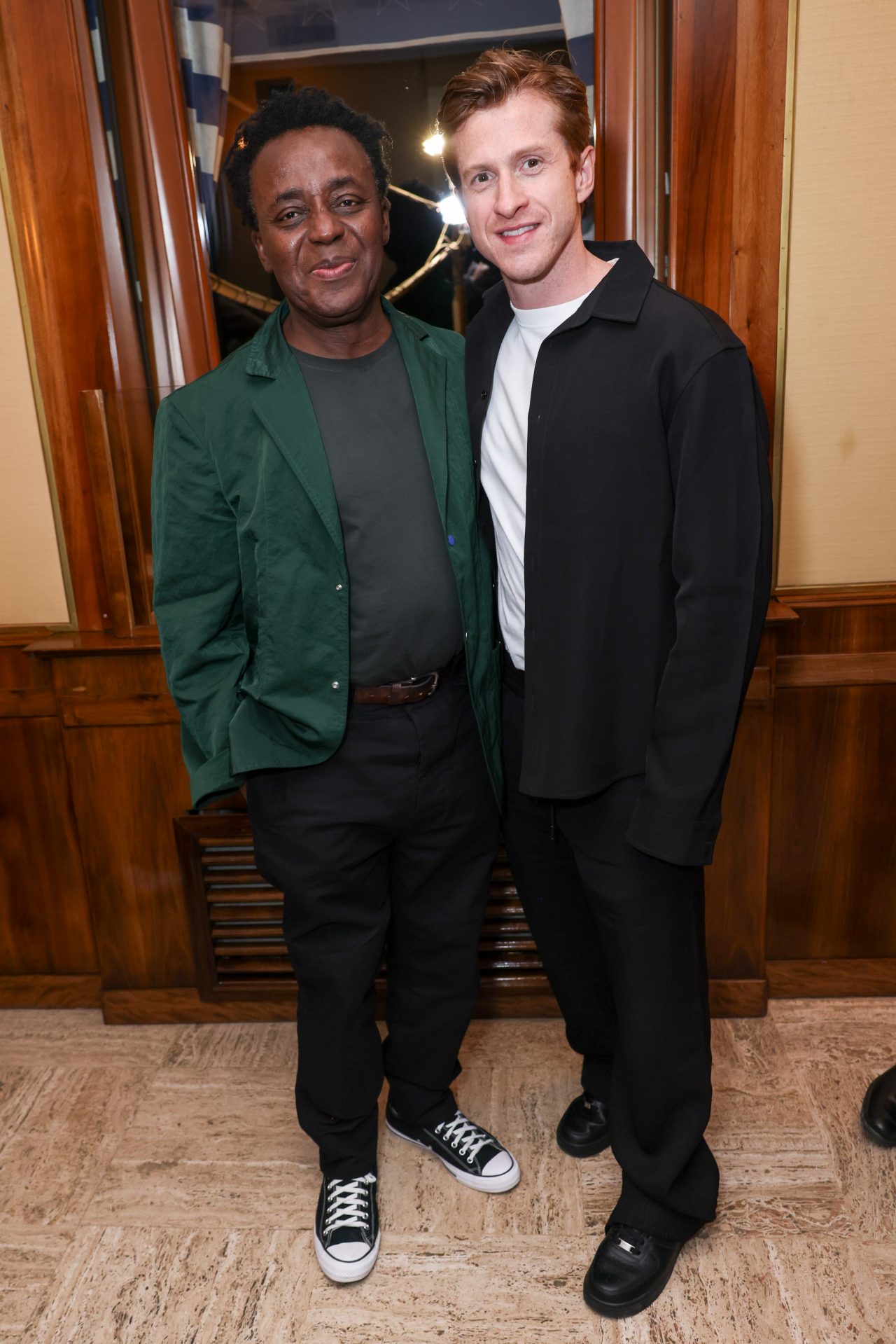 VENICE, ITALY - APRIL 18: John Akomfrah and Burberry Chief Creative Officer Daniel Lee attend the Burberry party at Harry’s Bar during the opening week of the 60th International Art Exhibition, La Biennale di Venezia, on April 18, 2024 in Venice, Italy. (Photo by Dave Benett/Getty Images for Burberry)